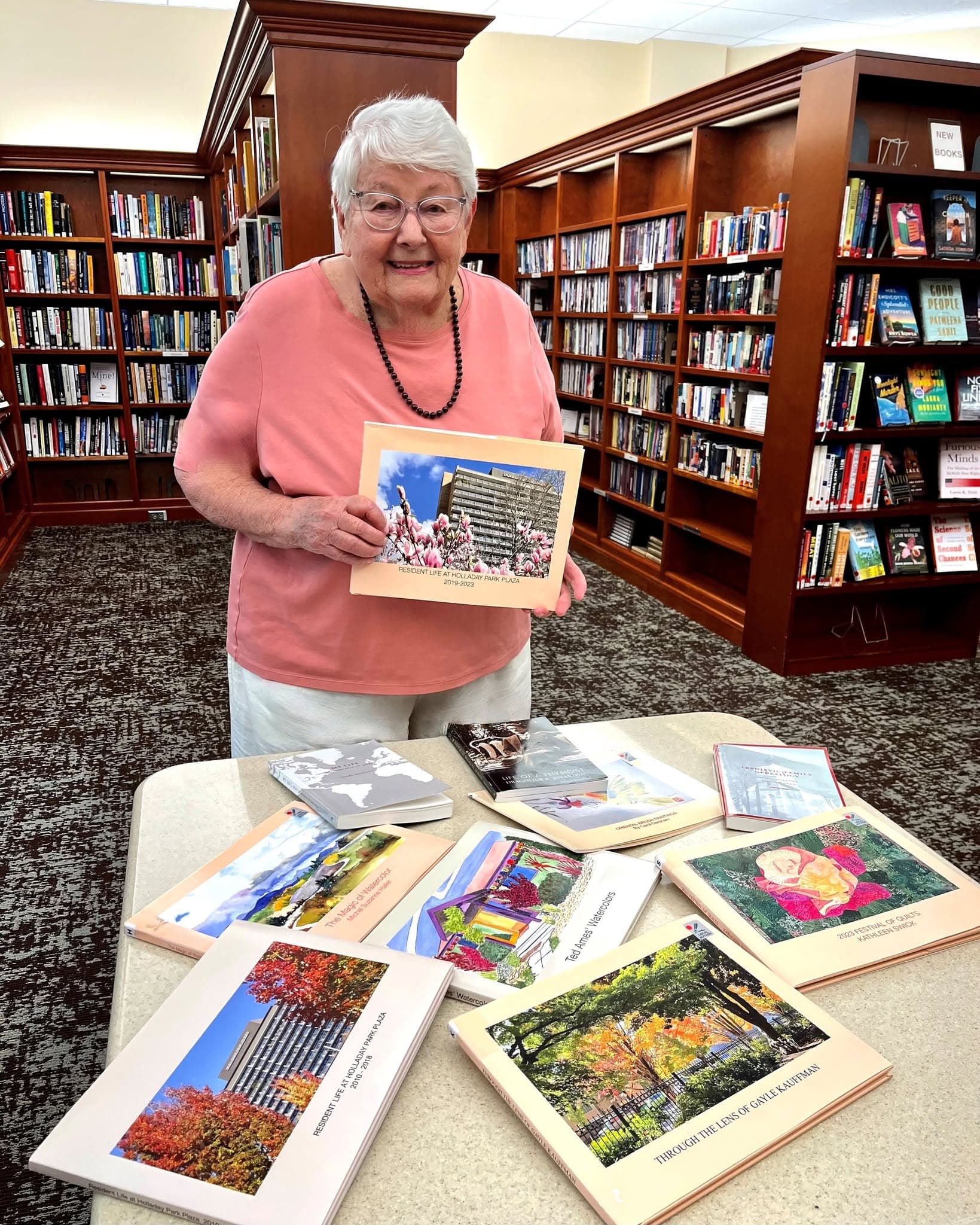 Photo of HPP Resident with books